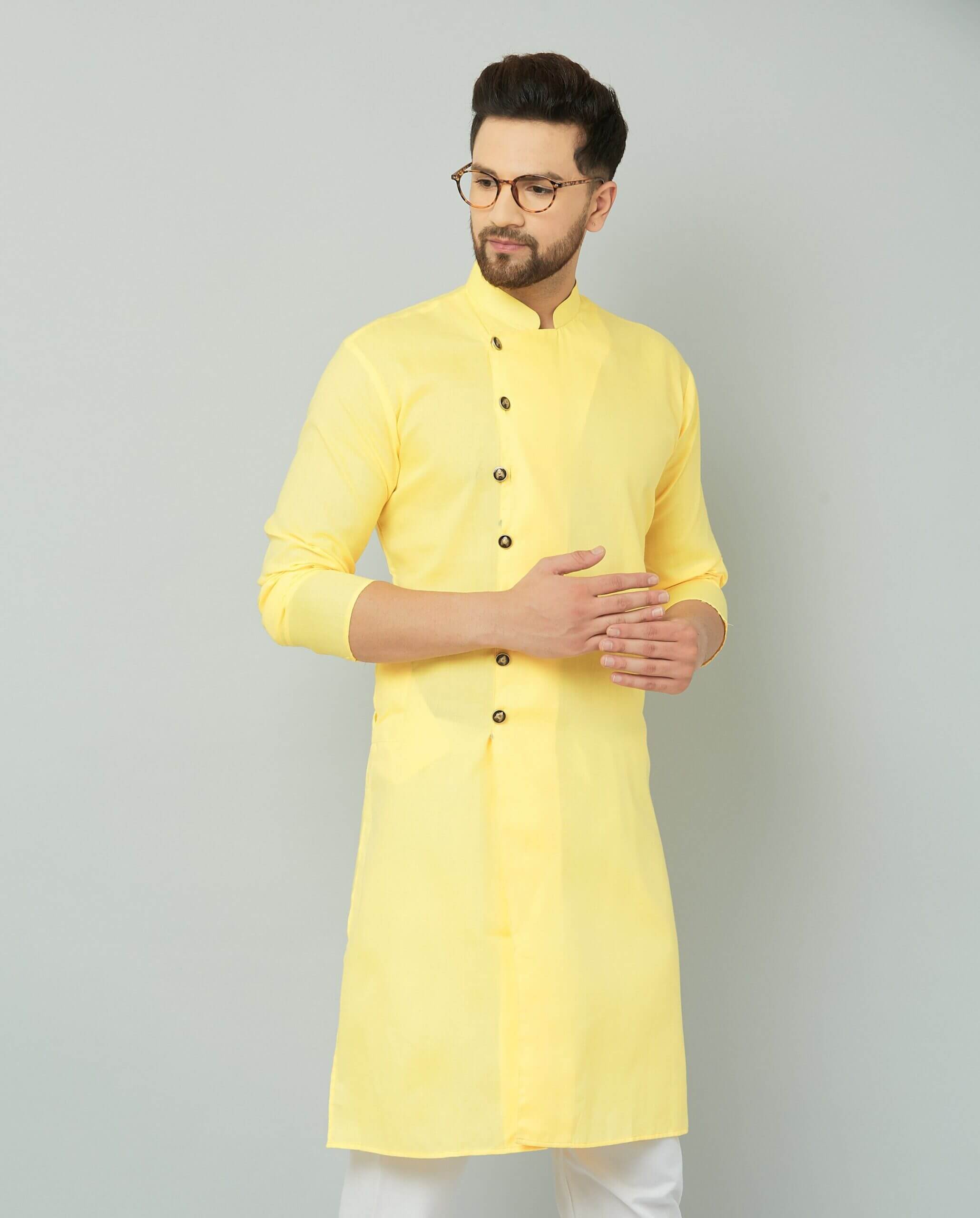 Yellow cotton kurta with solid design. Yellow cotton kurta with solid design.