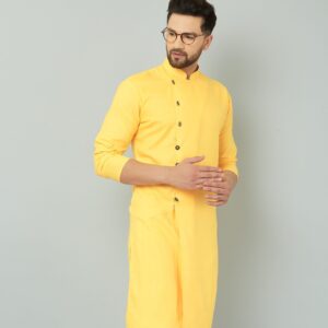 Traditional Indian yellow cotton kurta.