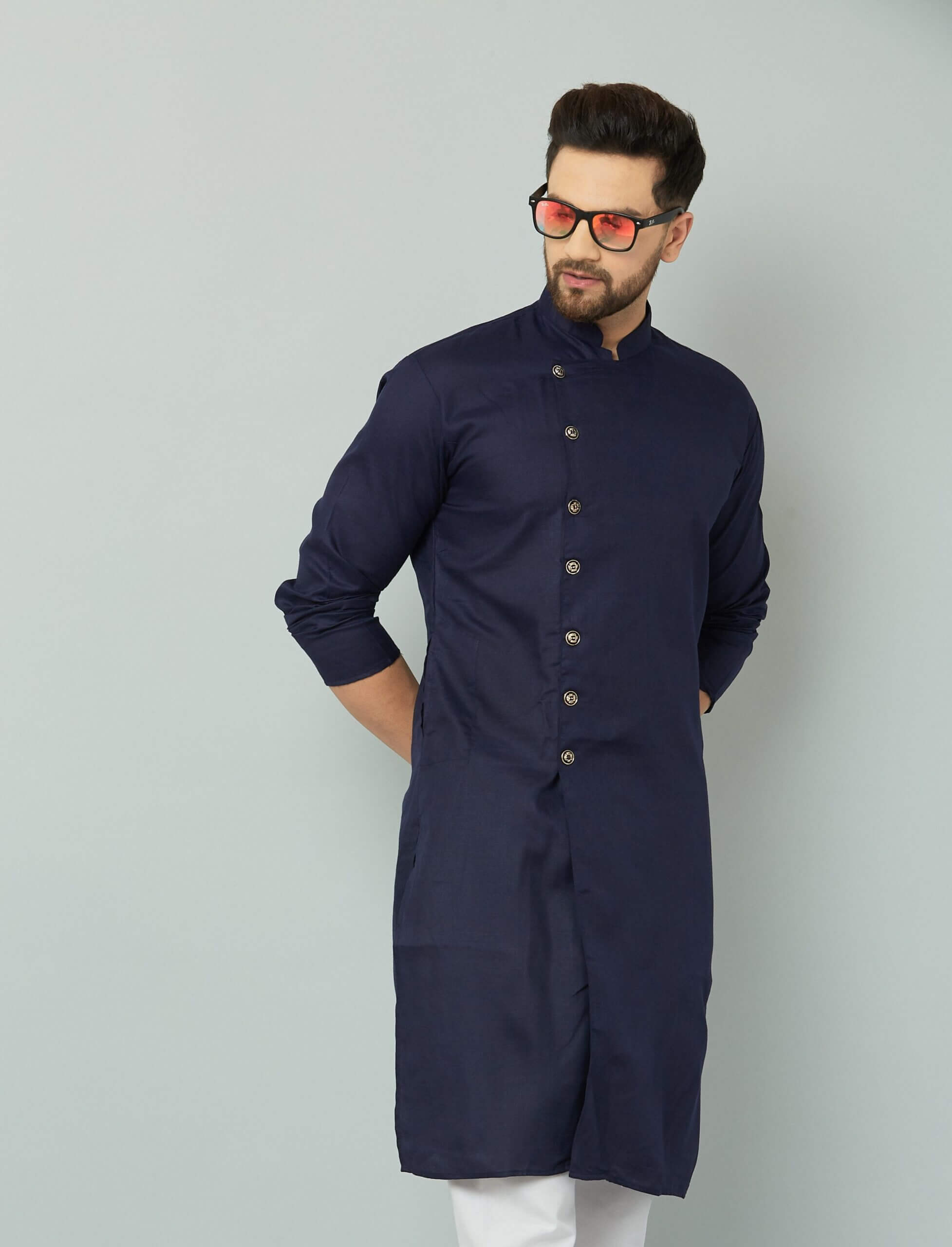 p (4)-min Traditional Indian men's navy blue kurta with intricate embroidery.