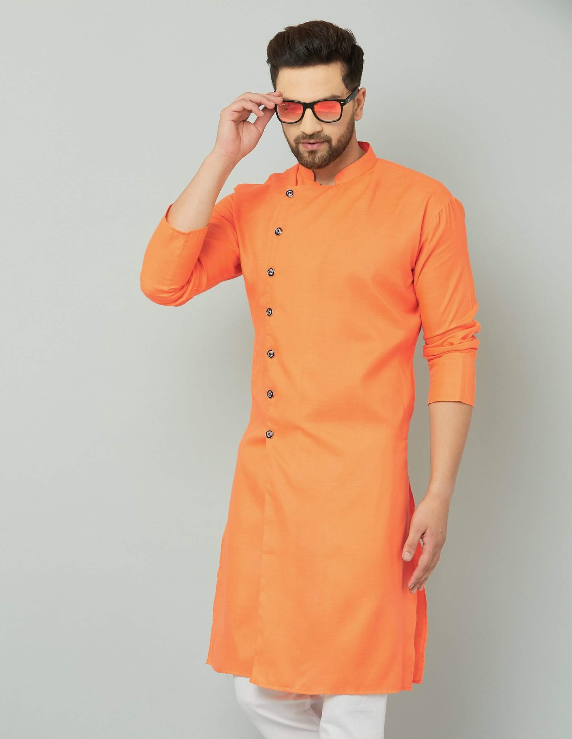 p (5)-min Orange cotton kurta with white pants, traditional Indian attire.