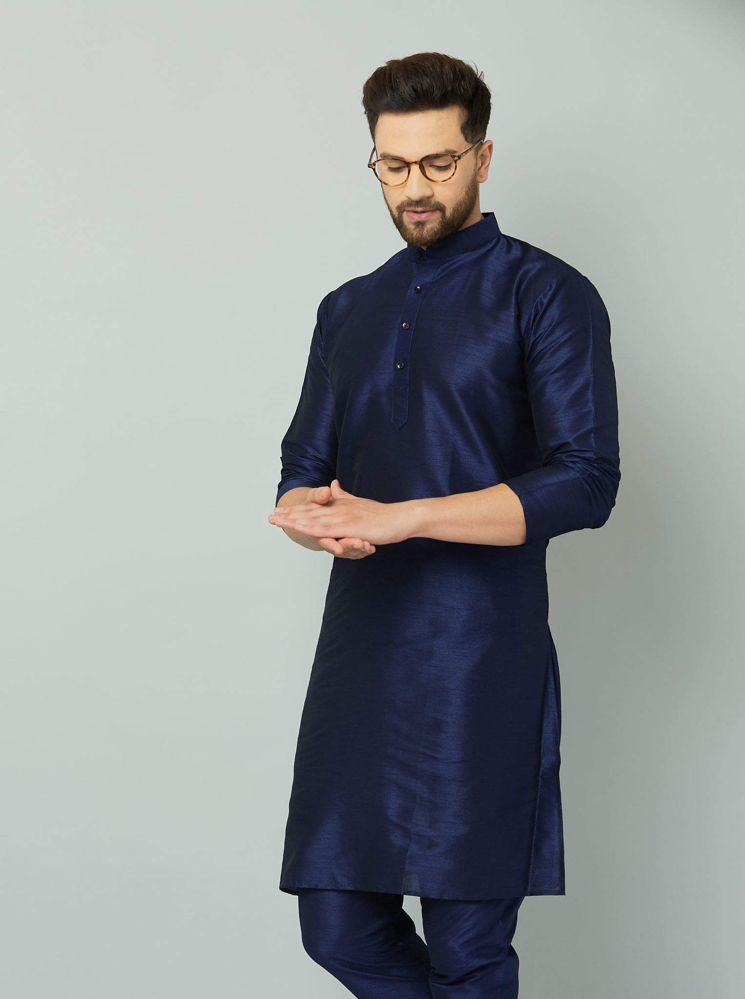 Adorable Classy Silk Kurta-Navy Stylish navy silk kurta with intricate embroidery.